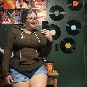 Brown long sleeve hoodie sweater! Chunky pink thread accent and pink drawstring.